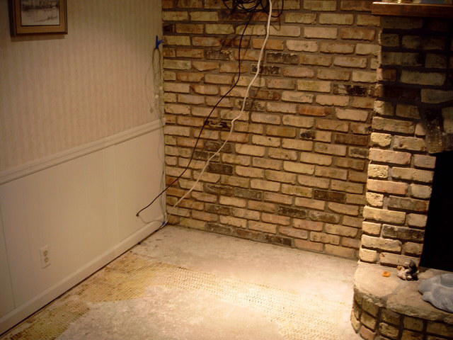 This shows the repaired wall, with new moldings added to the corner.